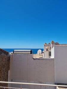 a view from the roof of a building at Casa Nelinha by Rosado in Luz +9 photos