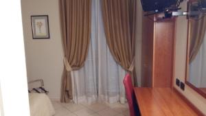 Foto Astis asuva majutusasutuse Hotel Cavour galeriist