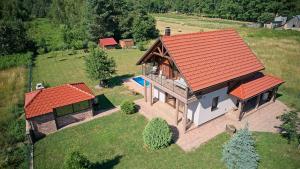 an overhead view of a house with an orange roof at Villa Debelo Brdo by Villas Guide in Debelo Brdo