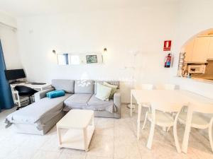 a living room with a couch and a table at Marbella Skol in Marbella