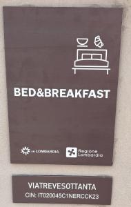 a sign for a bed and breakfast on a wall at Viatrevesottanta in SantʼAntonio