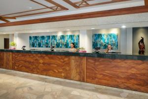 three women sitting at a bar in a hotel lobby at Marriott's Maui Ocean Club - Molokai, Maui & Lanai Towers in Lahaina +102 photos