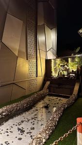 a swimming pool in a building with ailed floor at Grand Riviera Hotel in Port Harcourt