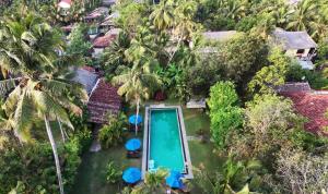 an aerial view of a resort with a swimming pool at Ayurveda Villa 386 in Ahungalla