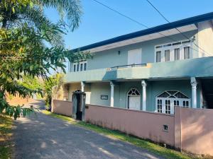 a building with a street in front of it at Ceylon Airport Apartment in Raddoluwa