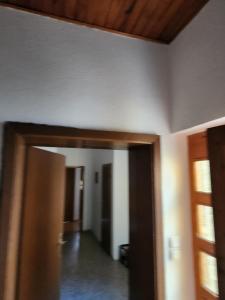 an open door to a hallway in a house at Gröningen in Gröningen
