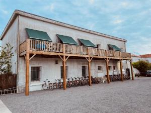 a building with bikes parked in front of it at The Corner Pavillon in Noirmoutier-en-l'lle