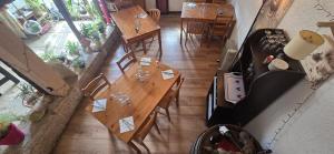 an overhead view of a restaurant with tables and chairs at La Bergerie Crenantine in Crenans