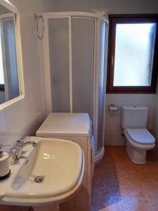 a bathroom with a sink and a toilet and a window at CR TESOL 6 SON - ALT ANEU in Son +23 photos