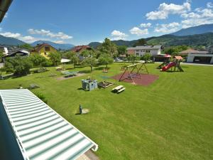 an aerial view of a park with a playground at Ferienwohnungen Kampitsch in Seeboden +30 photos