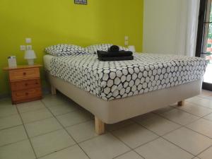 Postel nebo postele na pokoji v ubytování Bungalow Gialova
