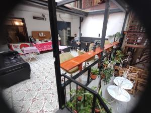 a view of a room with a table and some plants at Gafa Garden Hostel & Apartments - Great Location in Istanbul