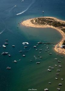 an aerial view of a bunch of boats in the water at Apartamento somo SARR in Somo