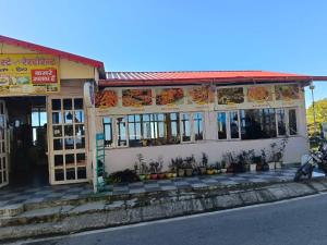 a restaurant on the side of the street at Lekhwar in Chamba