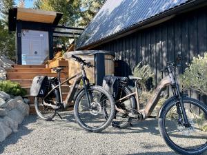two bikes parked in front of a building at Black Pine Cabin in Szentendre