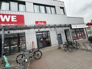 a group of bikes parked in front of a store at Pallas Hotels in Darmstadt
