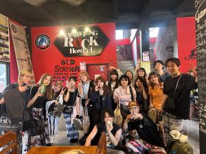 a group of people are posing for a picture at Rock Backpackers Central Hostel in Vang Vieng +55 photos