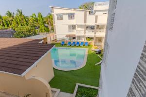 an aerial view of a house with a swimming pool at Wendy's Da-Azizi Homes Diani 2 in Diani Beach