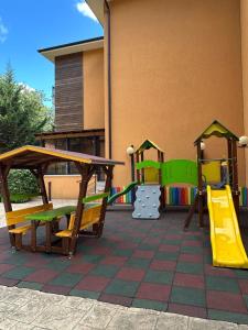 a playground with a slide and a slide at Boulevard Sea Residenz 250 meter zum Sandstrand in Sunny Beach