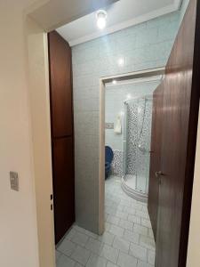 a bathroom with a shower and a toilet in a room at Carpe Diem Gonnet in Joaquín Gorina