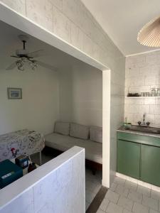a living room with a couch and a sink at Carpe Diem Gonnet in Joaquín Gorina +13 photos