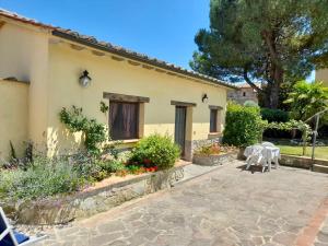 a house with a patio in front of it at Secret Haven in La Croce