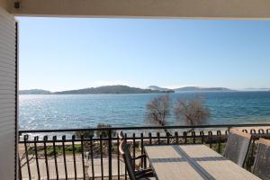 a view of the water from the balcony of a house at Apartments Aurelia in Vodice