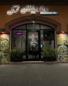 a store front of a restaurant with a sign on it at San Carlos de Reynosa in Reynosa