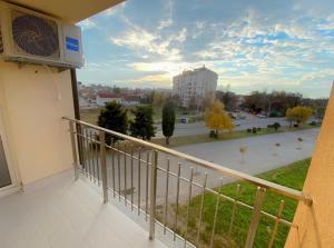 a balcony with a view of a parking lot at Ana VS Apartment in Ohrid