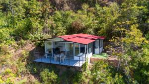 an overhead view of a house in the forest at Altavista Tinyhouse in Macanal