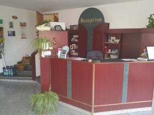 a reception area of a pharmacy with a reception desk at Weißes Roß Crossen in Ahlendorf