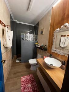 a bathroom with a sink and a toilet in it at Salamandra in Carboneras +84 photos