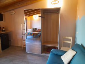 a living room with a sliding glass door in a room at Olystic bed and breakfast in Seriate