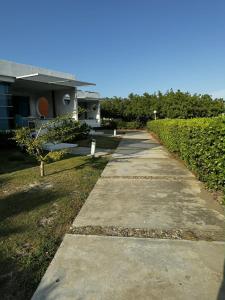 a walkway in front of a house at 31 Exclusive Cabin with Private Jacuzzi, Beach in Tubará