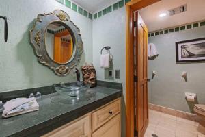 a bathroom with a sink and a mirror at Charming Condo in Great Location Pinacate 412 in Puerto Peñasco