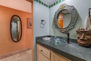 a bathroom with a sink and a mirror at Charming Condo in Great Location Pinacate 412 in Puerto Peñasco