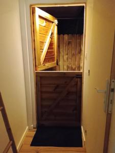 a door to a horse stall in a house at Tialba Lodge in Sainte-Anne