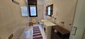 a bathroom with a sink and a toilet and a shower at Casa Leonardo in Tirano +41 photos