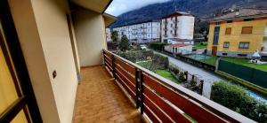 a balcony with a view of a city at Casa Leonardo in Tirano