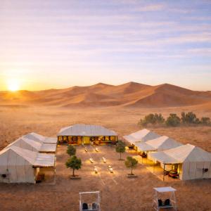 an aerial view of tents in the desert at Achabou Desert Camp in Merzouga