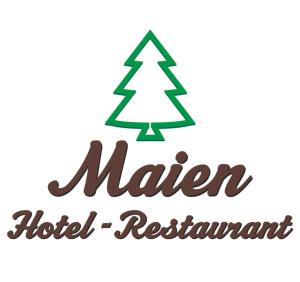 a christmas tree with the words hotel marker hotel restaurant at Hotel-Restaurant Maien in Todtmoos +1 photo