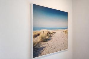 a painting of a picture of a beach at Spot Apartment in Palma de Mallorca