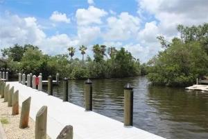 a view of a river with trees and bushes at Welcome to Highland Shore in Ellenton