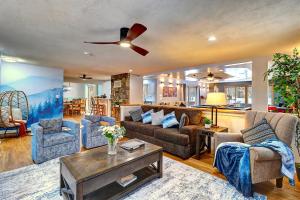 a living room with a couch and chairs at 6BR Luxury Mountain Retreat - Hot Tub, Game Room, Lake, Beach, Karaoke, Bar, Poconos in Albrightsville
