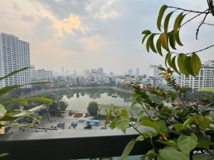 a view of a large body of water in a city at Sunny Hotel 1 in Hanoi