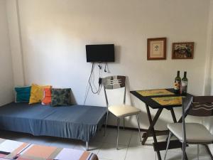 TV a/nebo společenská místnost v ubytování Studio Piedade