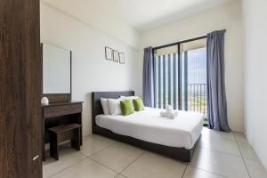 a bedroom with a bed and a large window at Meritus Suites - 8pax in Perai +168 photos