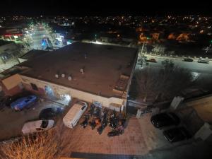 an aerial view of a large parking lot at night at Hotel Restaurant Bougafer in Midelt