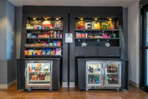 a store with two refrigerators in a room at Hampton Inn by Hilton Spring Hill in Timber Pines