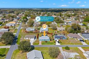 an aerial view of a small town with a sign at 882 Cody Avenue in Sebastian